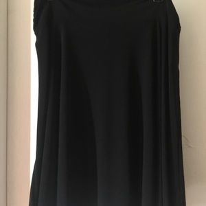 Black skirt...knee length...very flowy and comfy